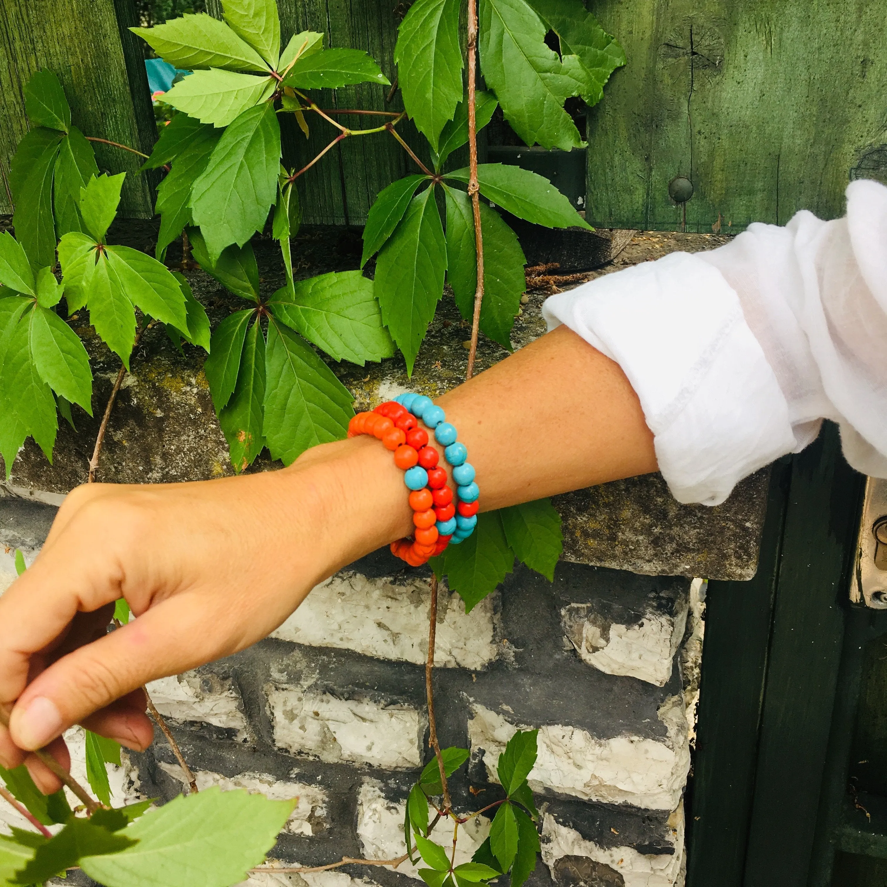 Orange Wanderlust Turquoise Howlite Mala Bracelet